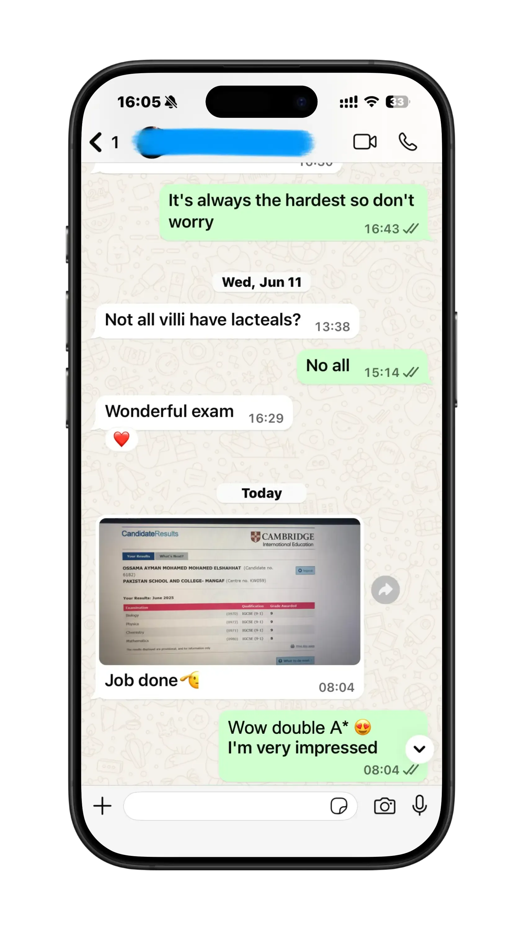 WhatsApp chat where a parent thanks Mr. Hosni for their child's IGCSE science results
